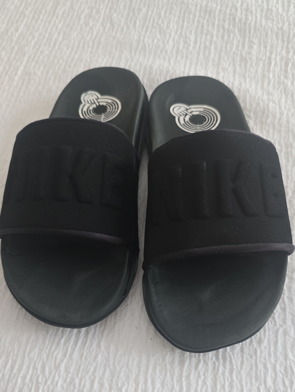 Nike Kids Black Slide Sandals with Embossed Logo